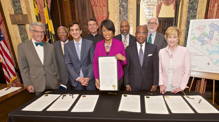 Mayor Rawlings-Blake and leaders of anchor institutions sign the Baltimore City Anchor Plan pledge